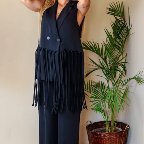 Conjunto chaleco y pantalón flecos